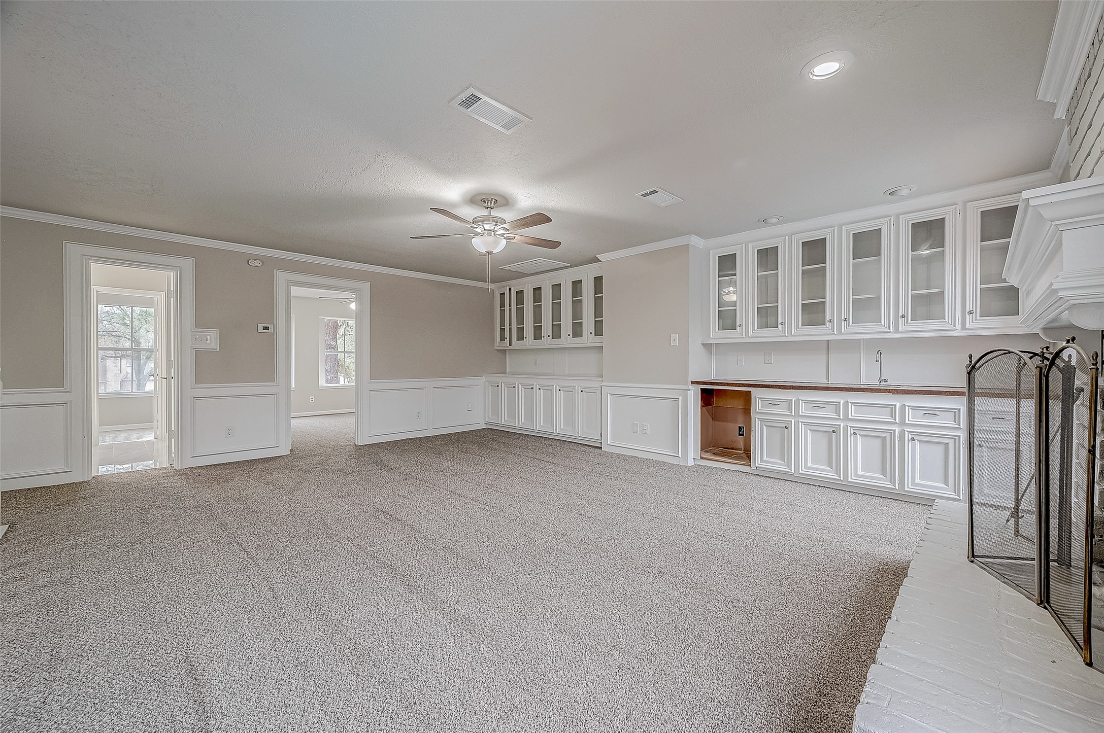 4218 Bayglen Court Houston, TX 77068 - Photo 21 of 42 a view of an empty room with chandelier