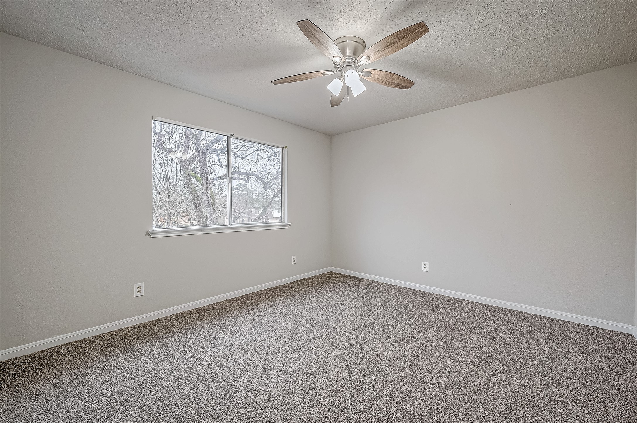 4218 Bayglen Court Houston, TX 77068 - Photo 23 of 42 an empty room with a window