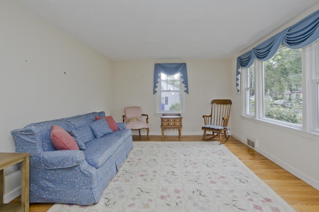54 Mohawk Drive Springfield, MA 01129 - Photo 17 of 35 a living room with furniture and a window