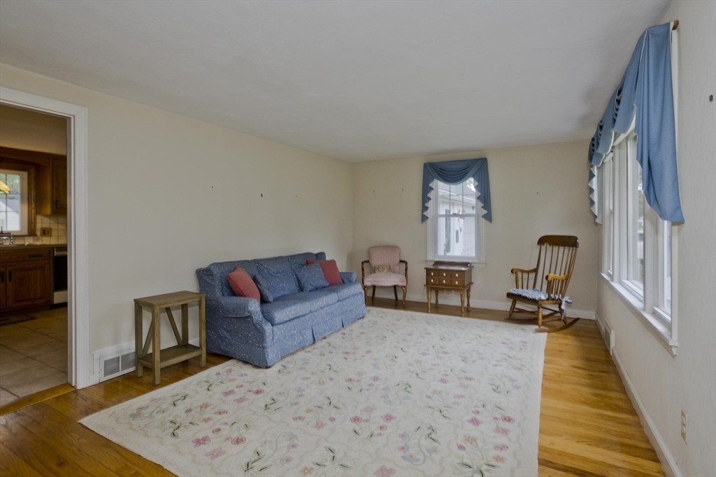 54 Mohawk Drive Springfield, MA 01129 - Photo 20 of 35 a living room with furniture and a wooden floor