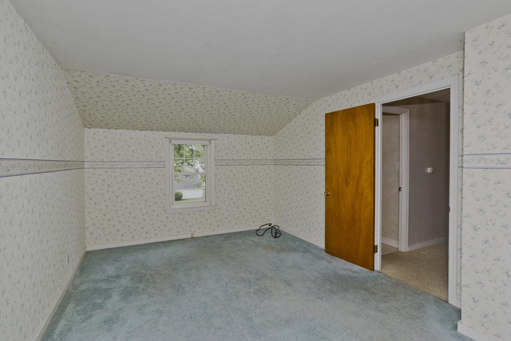 54 Mohawk Drive Springfield, MA 01129 - Photo 25 of 35 an empty room with windows