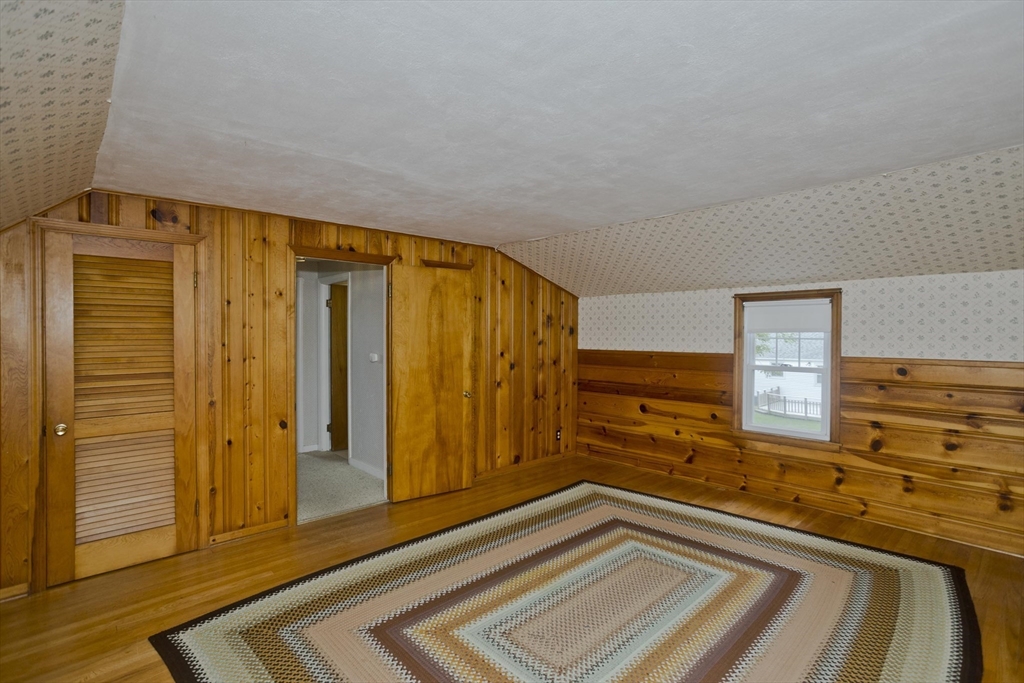 54 Mohawk Drive Springfield, MA 01129 - Photo 28 of 35 a view of a closet area with wooden floor
