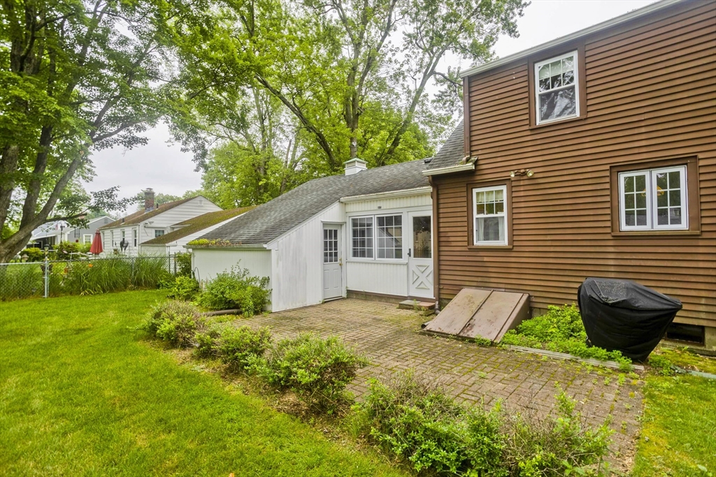 54 Mohawk Drive Springfield, MA 01129 - Photo 33 of 35 a view of a house with backyard and sitting area