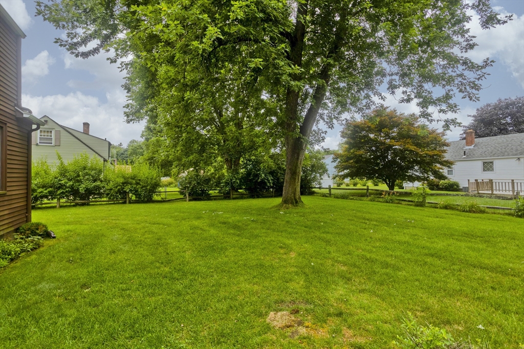54 Mohawk Drive Springfield, MA 01129 - Photo 35 of 35 a view of green field with trees in the background