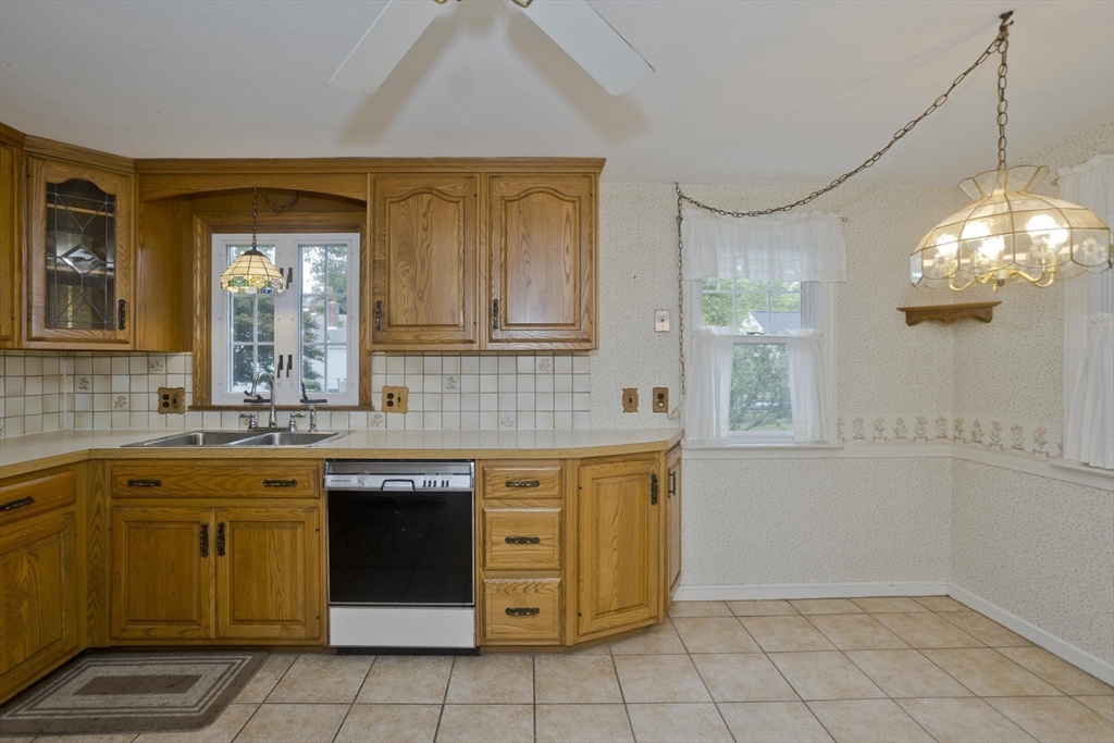 54 Mohawk Drive Springfield, MA 01129 - Photo 6 of 35 a kitchen with a sink and cabinets