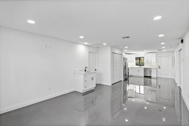 an empty room with windows