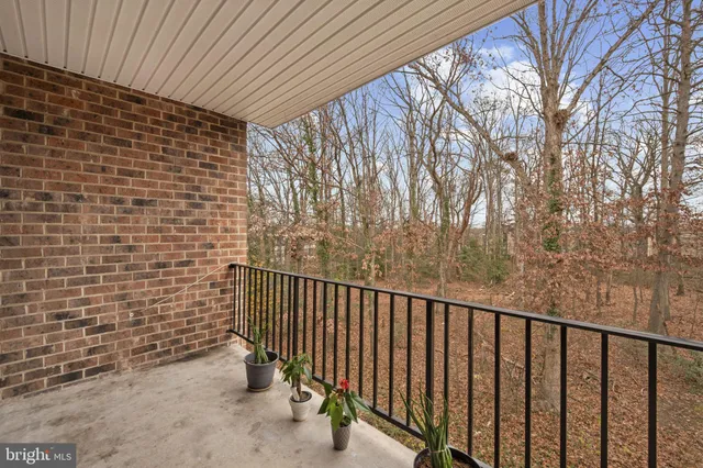 a view of outdoor space with deck and yard