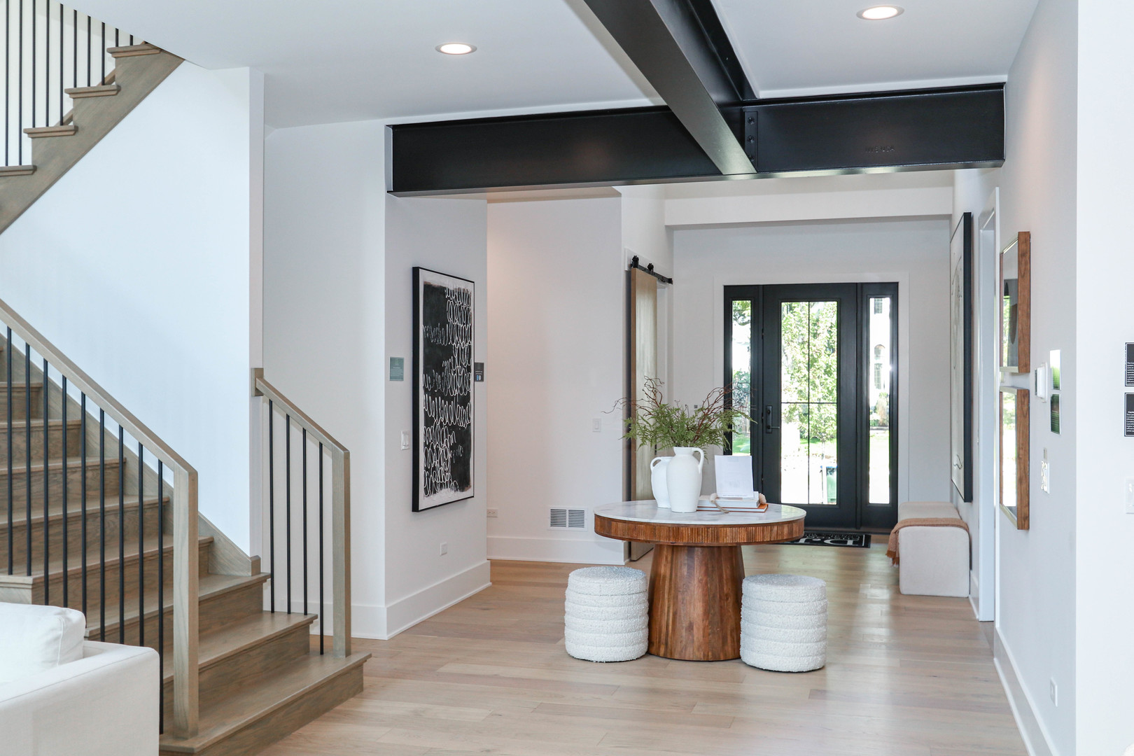 3316 Club Court Naperville, IL 60564 - Photo 2 of 26 a view of a hallway with wooden floor and a dining room