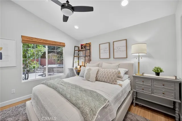 a en suite bathroom with double vanity and a mirror