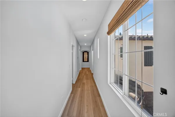 a bedroom with a bed and a table