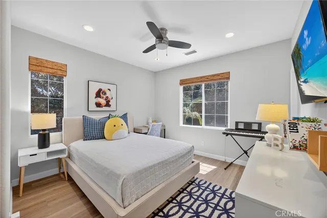 a view of patio with couches and a fire pit