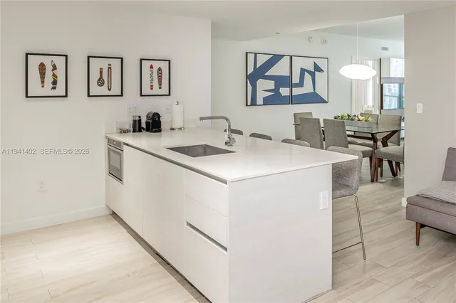 a view of living room filled with furniture and window