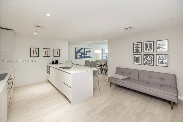 a living room with furniture and a table