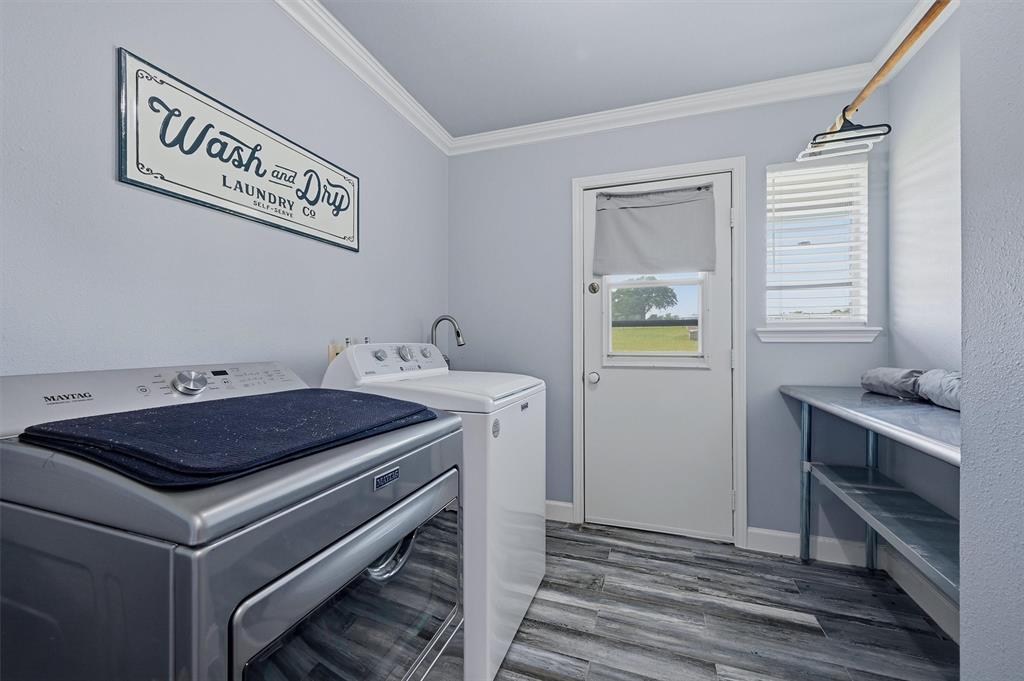 1861-1 Roland Road Whitesboro, TX 76273 - Photo 19 of 39 Spacious laundry room with direct access to the outdoors.
