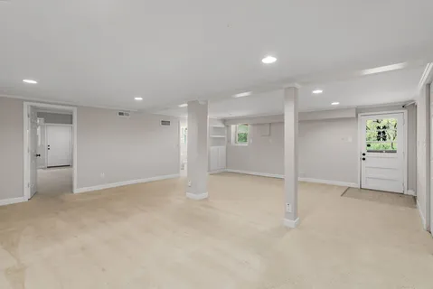 an empty room with a natural light