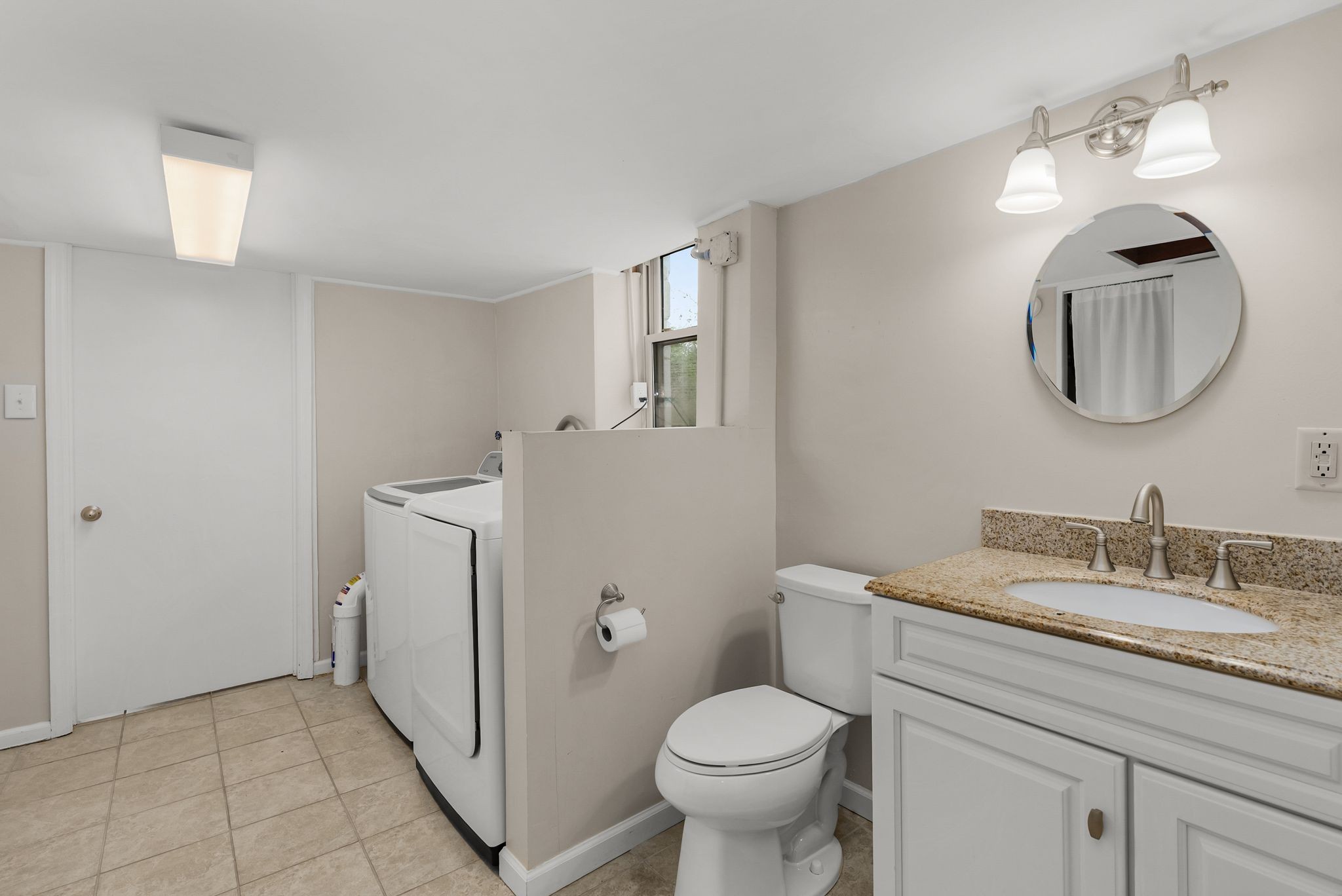 1217 A Davidson Road Nashville, TN 37205 - Photo 20 of 29 a bathroom with a toilet a sink and mirror