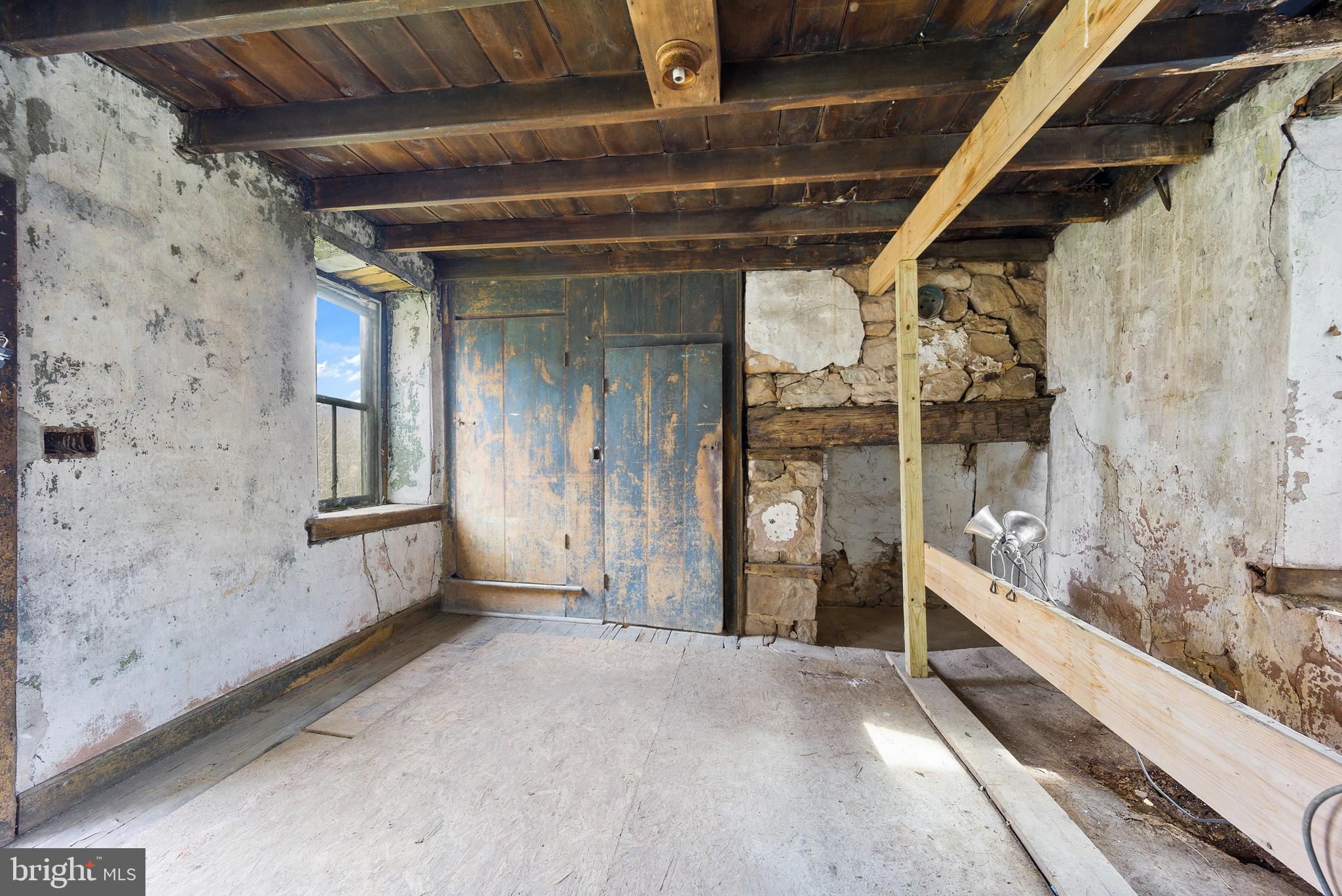 260 Bethesda Road Elverson, PA 19520 - Photo 23 of 35 Rear room with fireplace