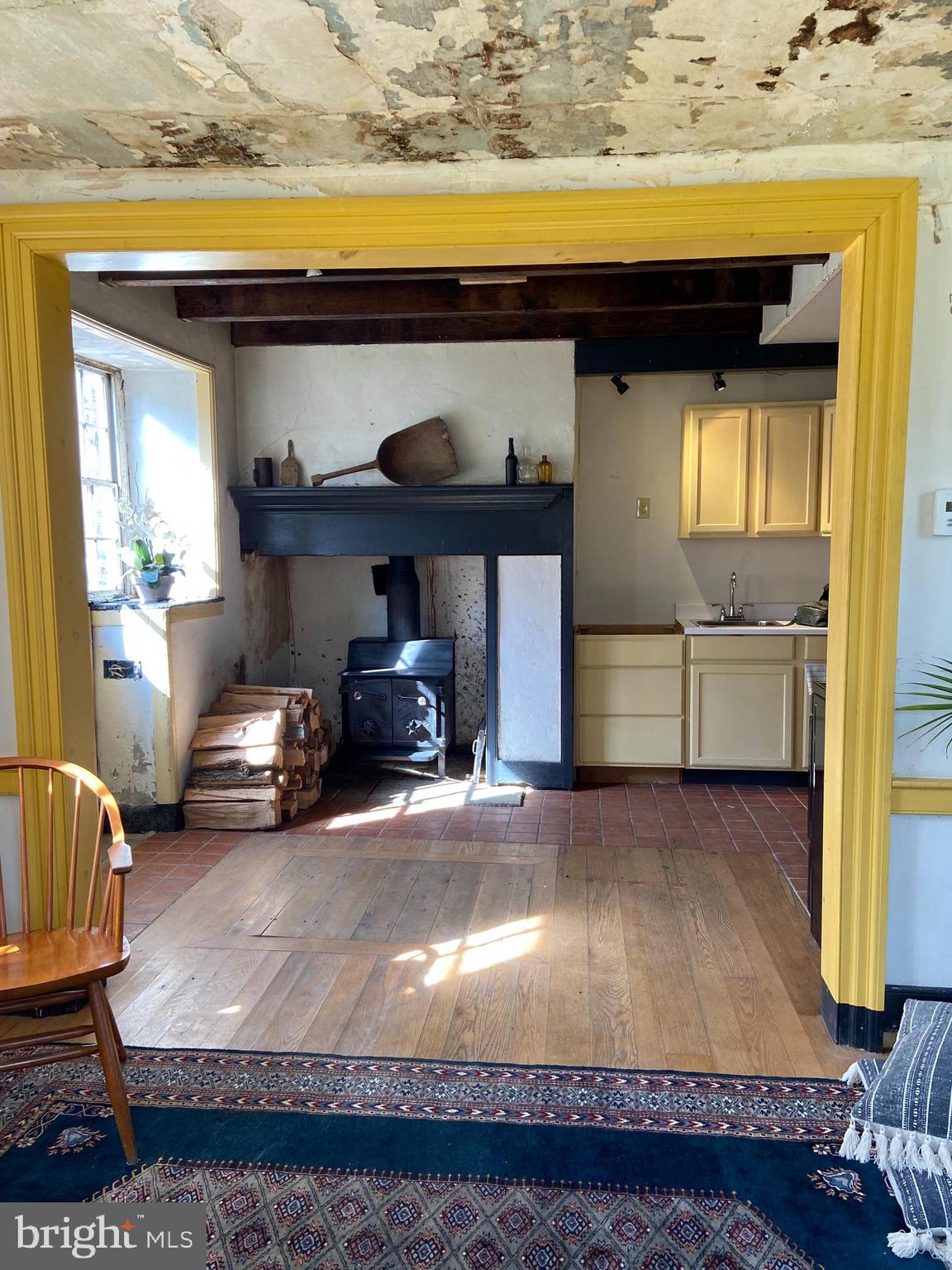 260 Bethesda Road Elverson, PA 19520 - Photo 7 of 35 Entry with wood stove