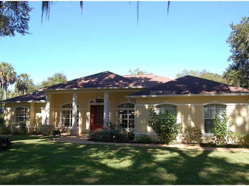 25 Weston Road Leesburg, FL 34748 - Photo 1 of 1 Exterior Front - Side Load Garage