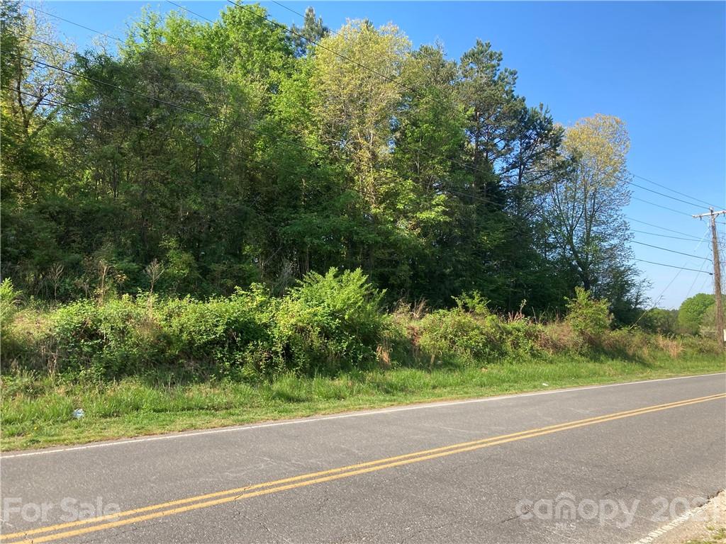 6155 Hopewell Road Hickory Grove, SC 29717 - Photo 1 of 15 a view of a yard and a house