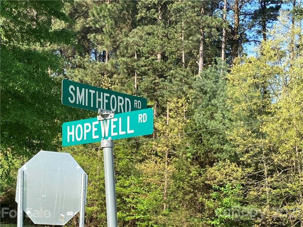 6155 Hopewell Road Hickory Grove, SC 29717 - Photo 13 of 15 a street sign that is on a pole