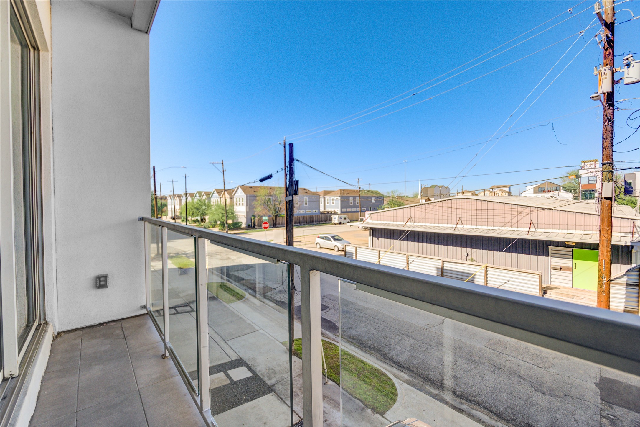 3306 Cline Street Houston, TX 77020 - Photo 12 of 30 a view of balcony with two chairs and a potted plant