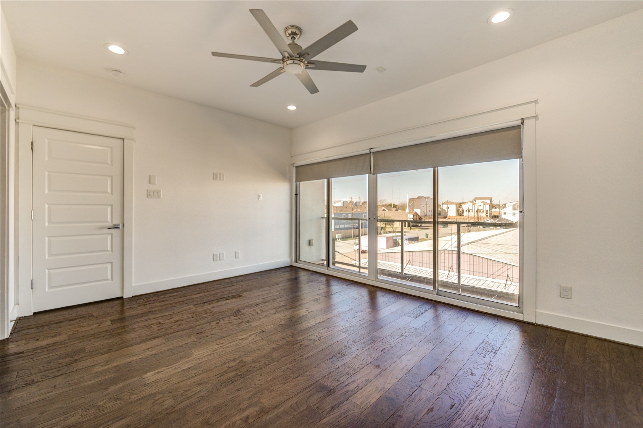 3306 Cline Street Houston, TX 77020 - Photo 16 of 30 wooden floor in an empty room with a window