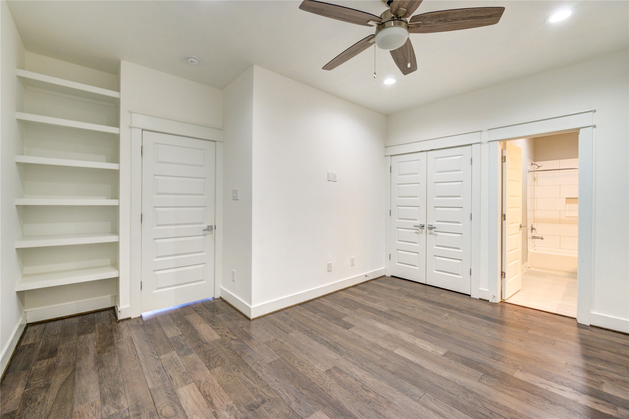 3306 Cline Street Houston, TX 77020 - Photo 21 of 30 wooden floor in an empty room with a window