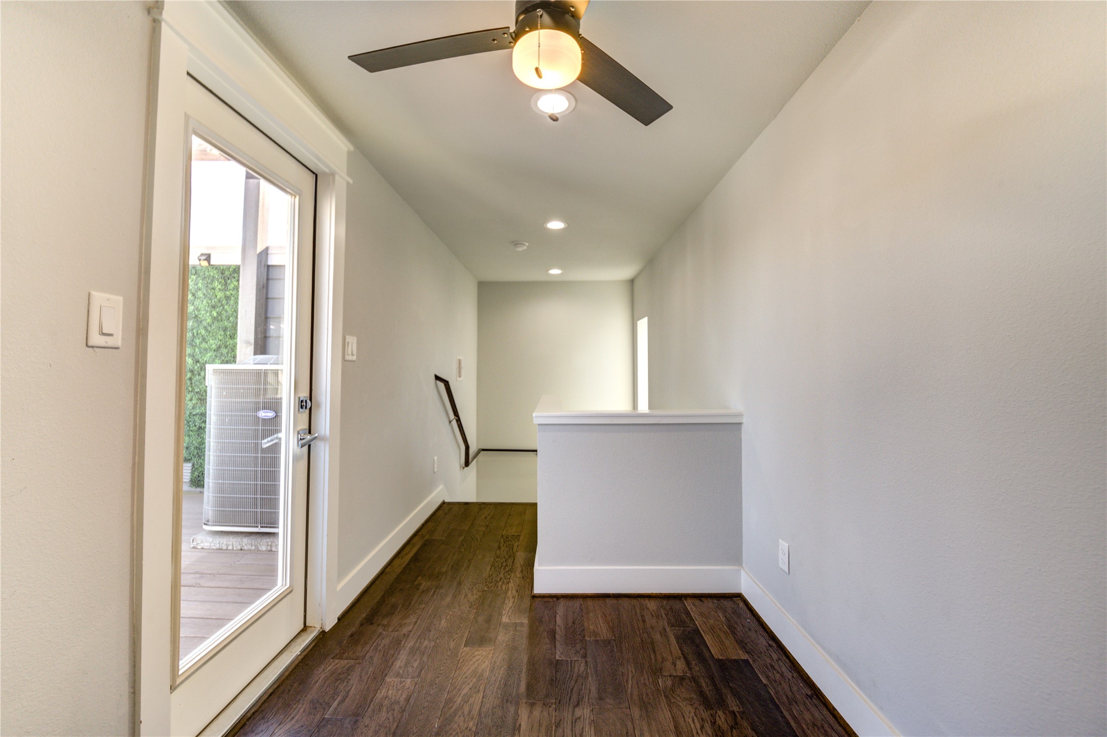 3306 Cline Street Houston, TX 77020 - Photo 26 of 30 a view of empty room with wooden floor and fan