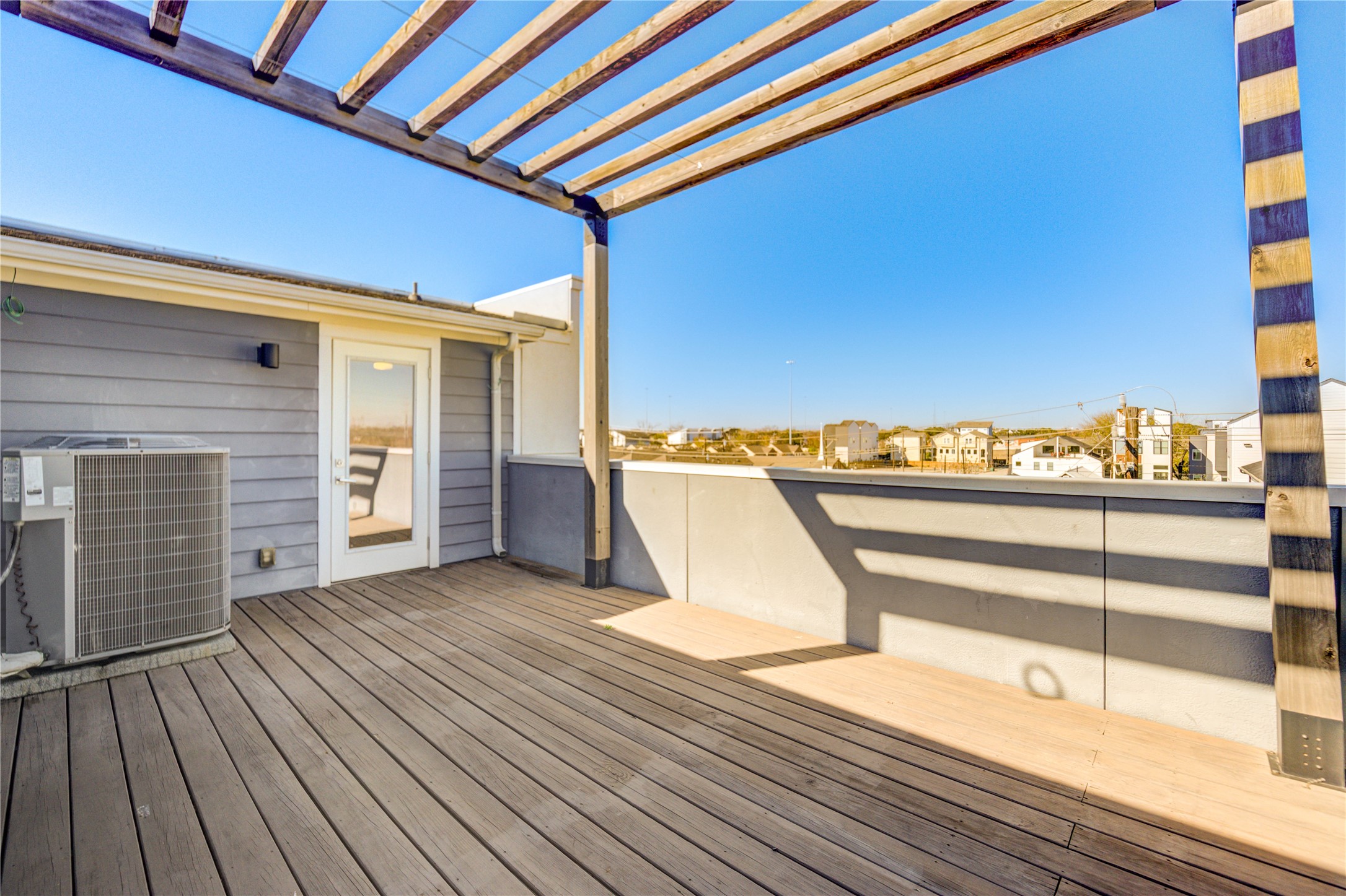 3306 Cline Street Houston, TX 77020 - Photo 28 of 30 a view of a balcony with wooden floor and seating space