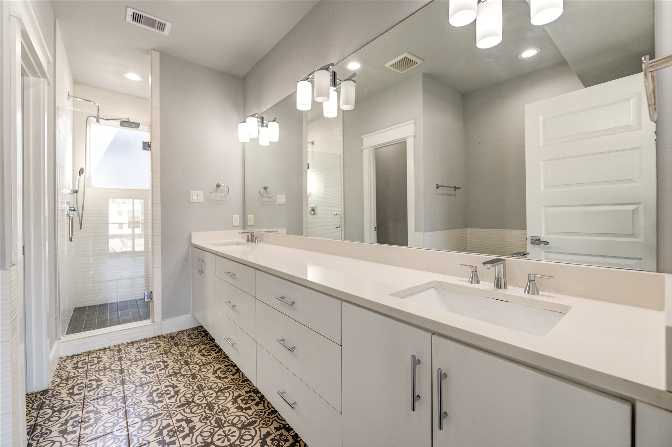 3306 Cline Street Houston, TX 77020 - Photo 4 of 30 a bathroom with a double vanity sink and a mirror