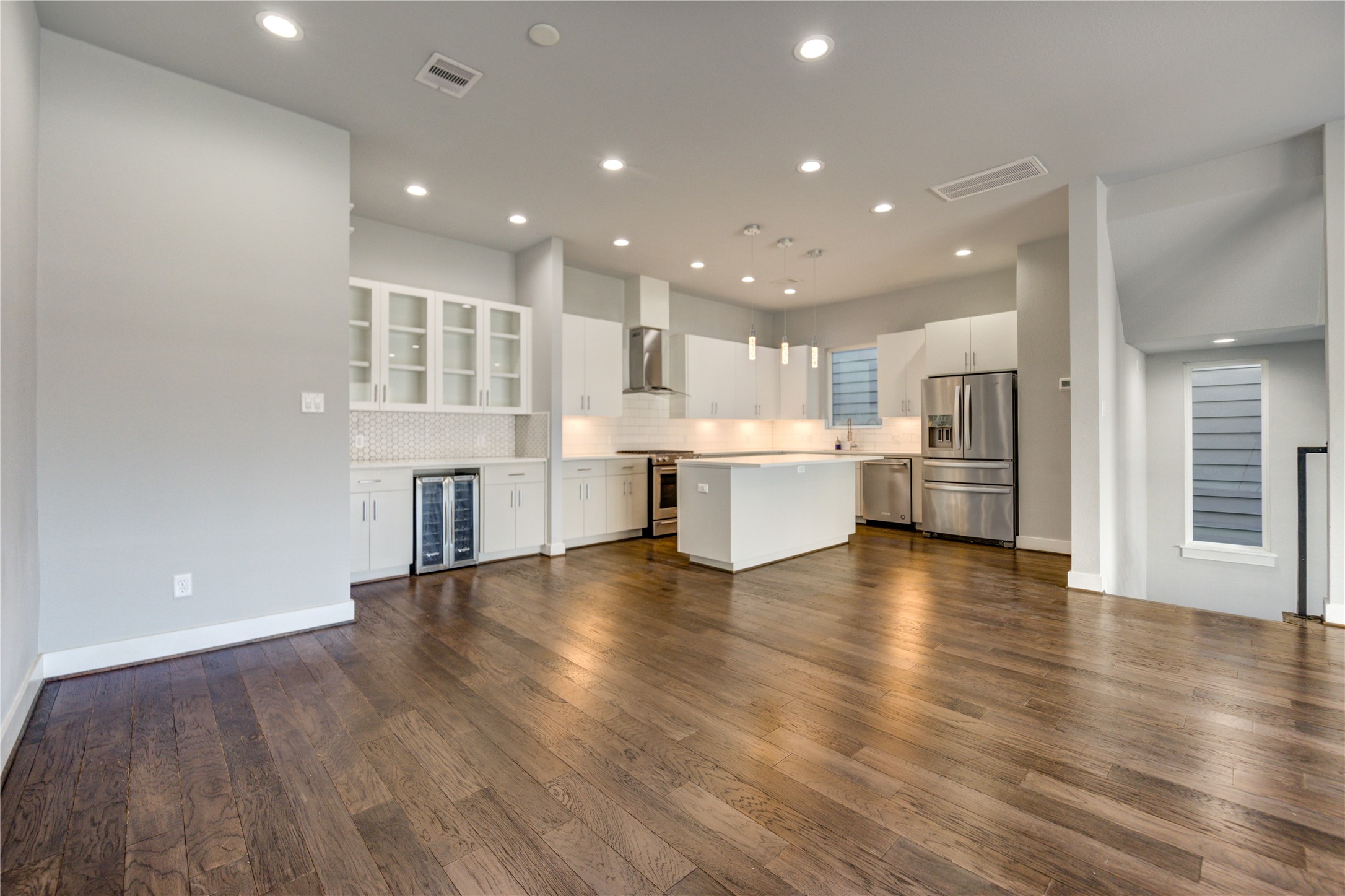 3306 Cline Street Houston, TX 77020 - Photo 8 of 30 a view of kitchen with wooden floor and windows