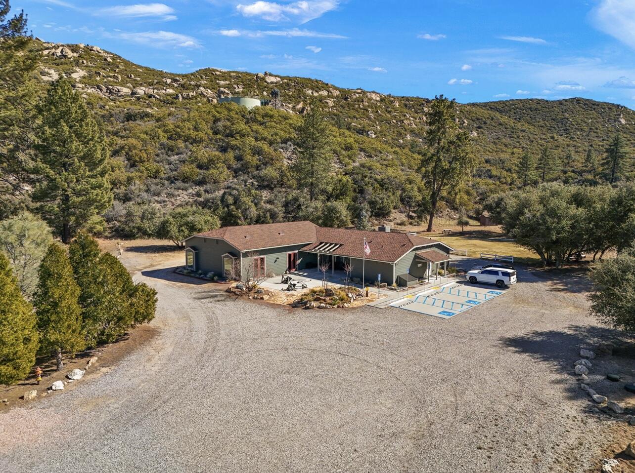 0 Chimney Rock Court Mountain Center, CA 92561 - Photo 19 of 24 an aerial view of a houses with a road