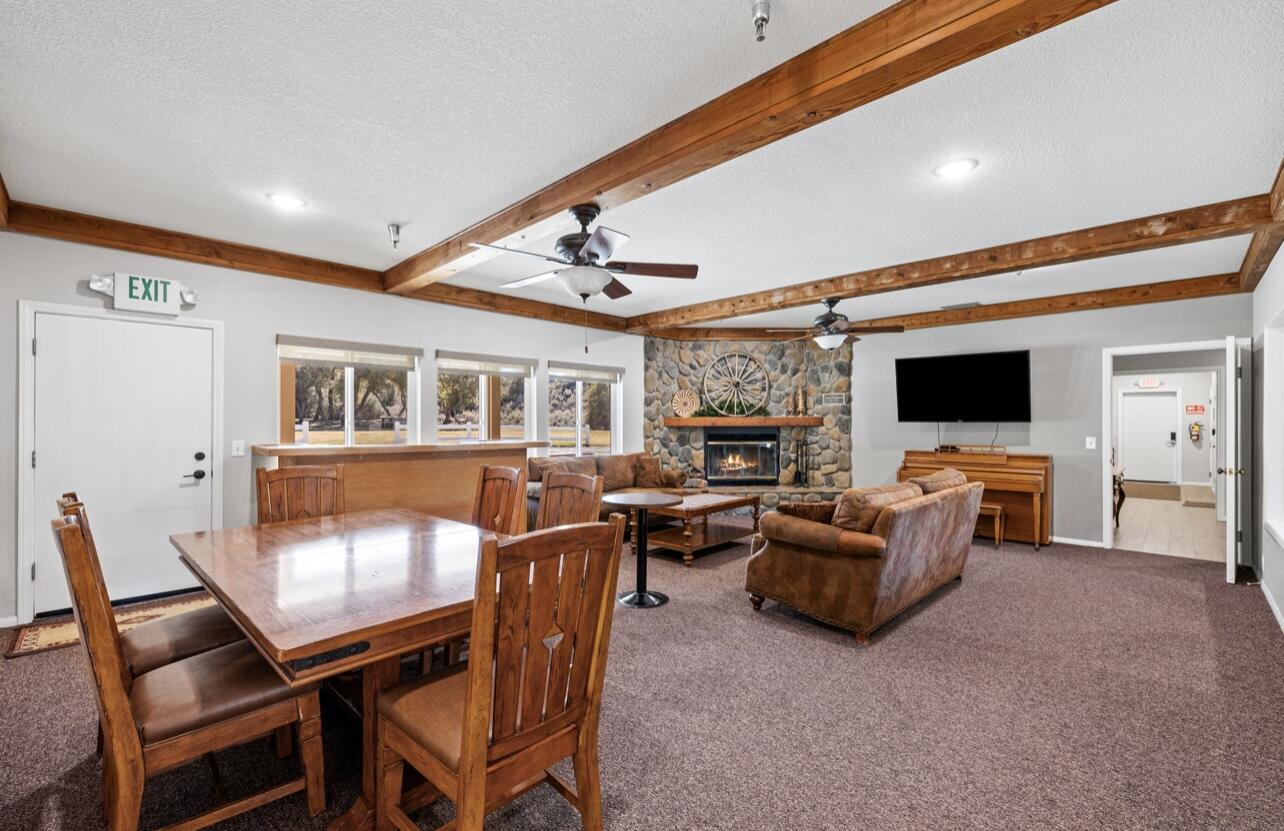 0 Chimney Rock Court Mountain Center, CA 92561 - Photo 24 of 24 a living room with furniture and a flat screen tv