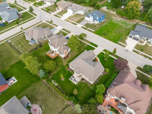 an aerial view of a house with a garden