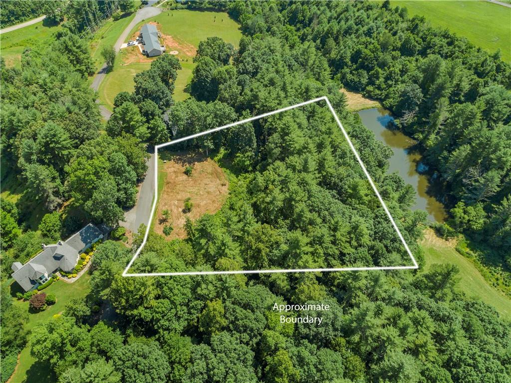 0 Forest Ridge Road, Unit 6 Mars Hill, NC 28754 - Photo 6 of 15 a view of a yard