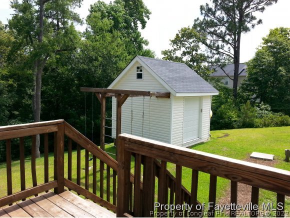 75 Holly Oak Circle Bunnlevel, NC 28323 - Photo 20 of 25 a balcony view with a garden space