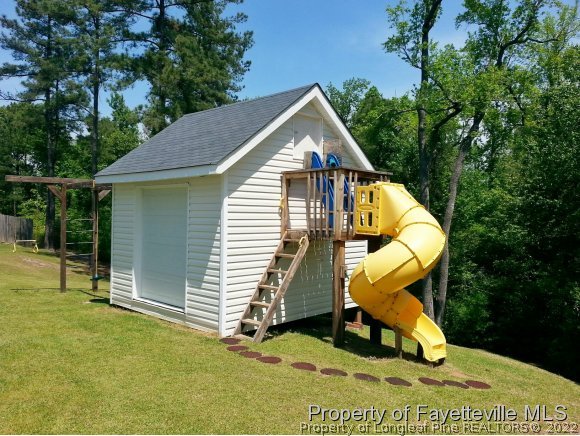 75 Holly Oak Circle Bunnlevel, NC 28323 - Photo 2 of 25 a view of backyard of a house