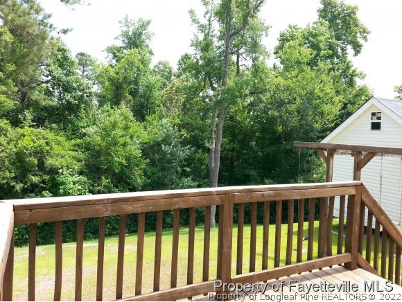 75 Holly Oak Circle Bunnlevel, NC 28323 - Photo 21 of 25 a view of a wooden fence