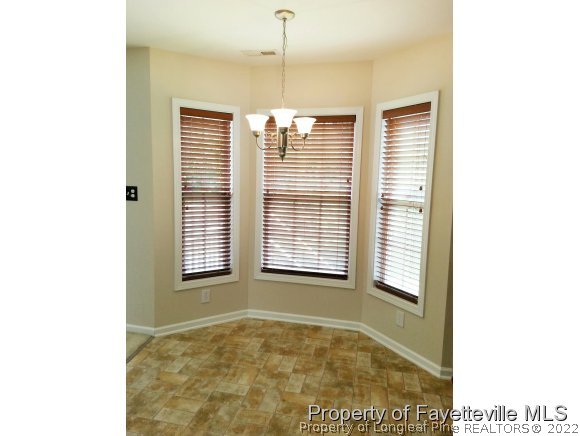 75 Holly Oak Circle Bunnlevel, NC 28323 - Photo 8 of 25 a view of an empty room with a window