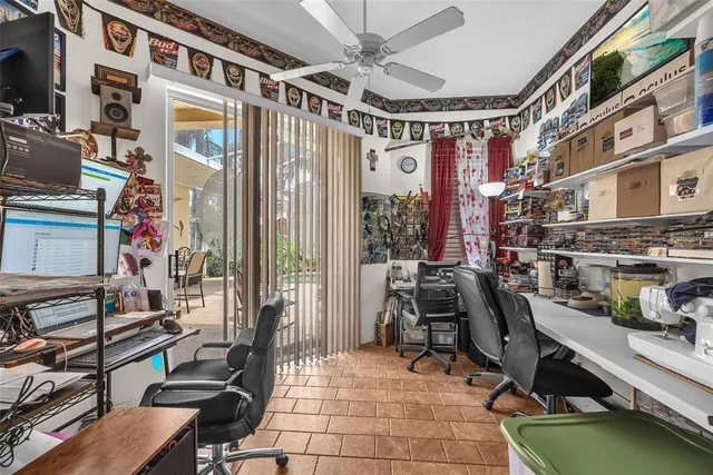 a view of a balcony with chairs and with furniture