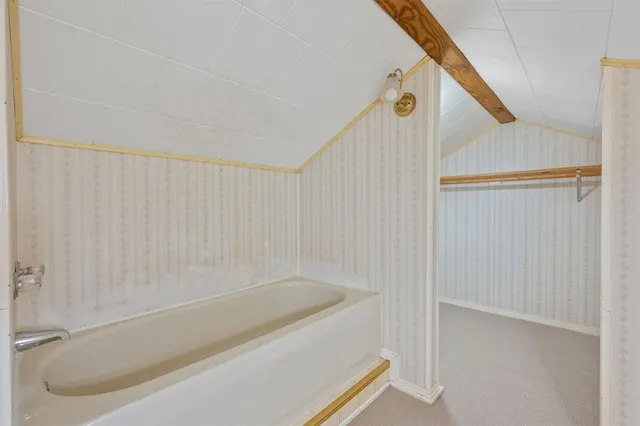 a bathroom with a bathtub