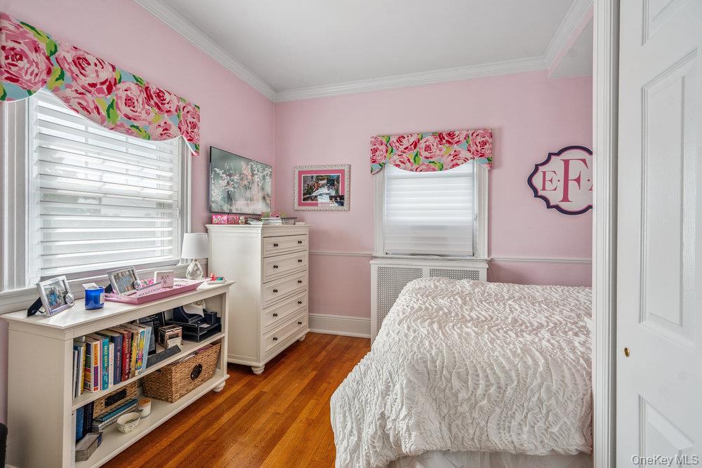 1 Bayview Avenue Islip, NY 11751 - Photo 11 of 18 a bedroom with a bed and a window