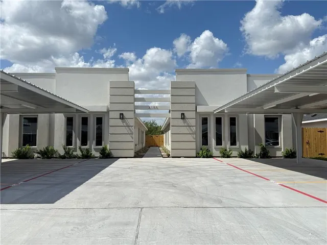 a view of a building with a street