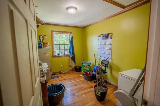 a room with furniture and a window