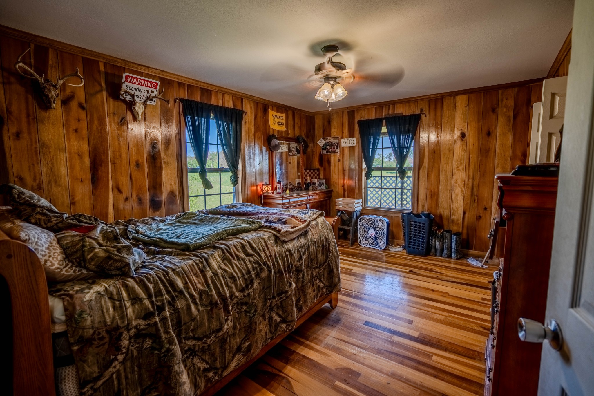 290 Prokesh Road Leoma, TN 38468 - Photo 25 of 43 a bed sitting in a bedroom next to a window