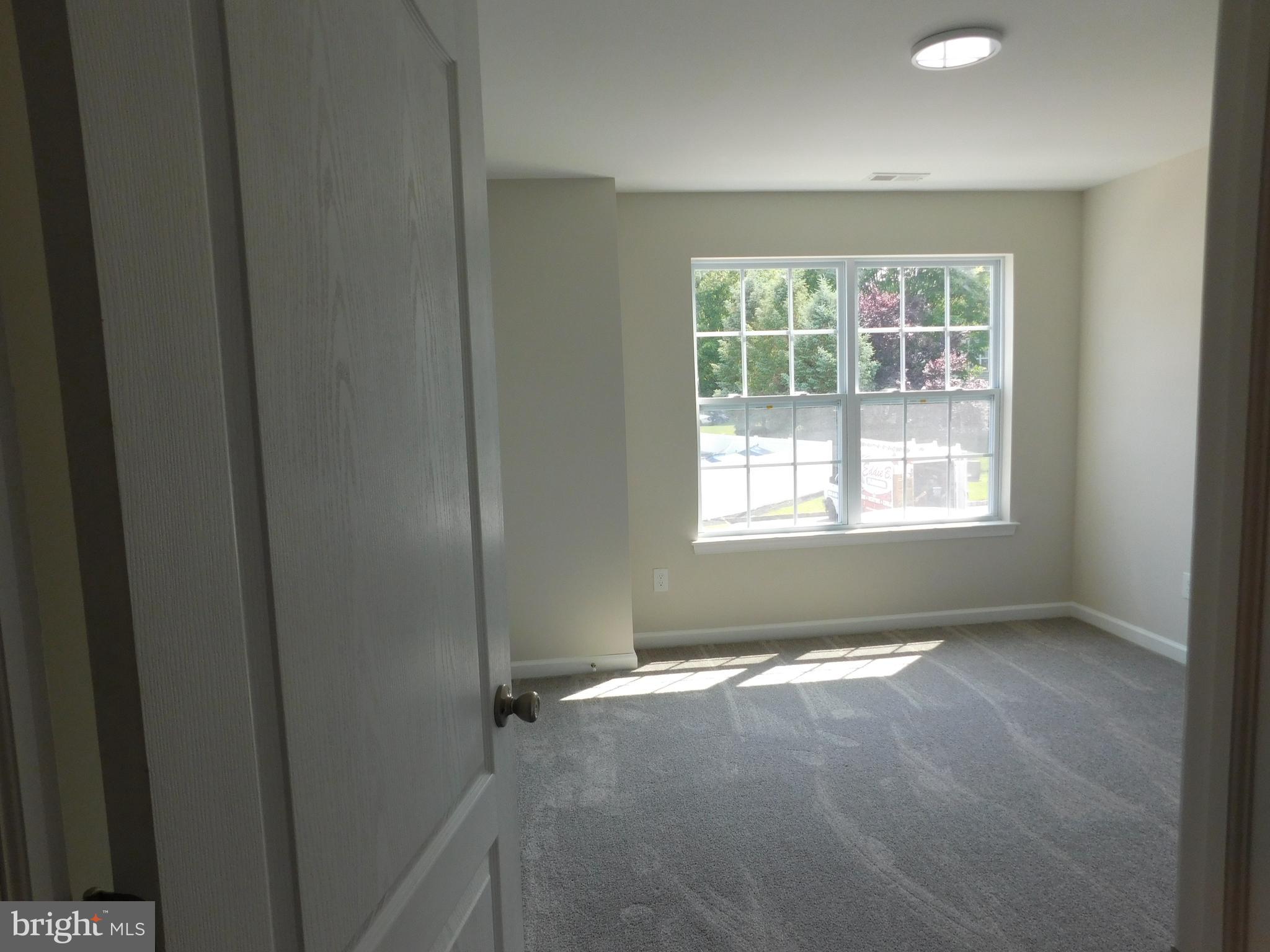 165 Natalie Road Delran, NJ 08075 - Photo 13 of 16 a view of an empty room with a window