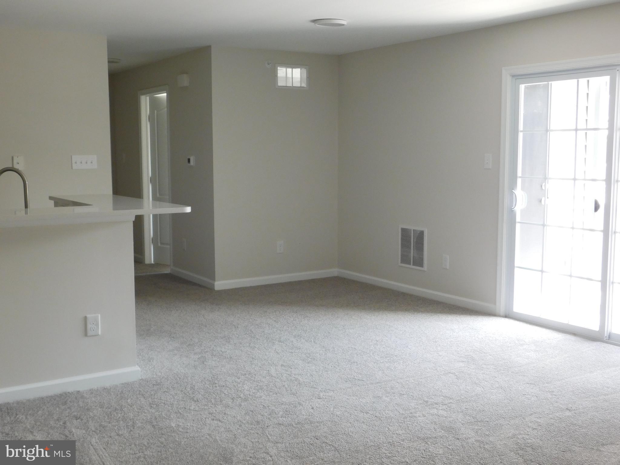 165 Natalie Road Delran, NJ 08075 - Photo 3 of 16 an empty room with a window