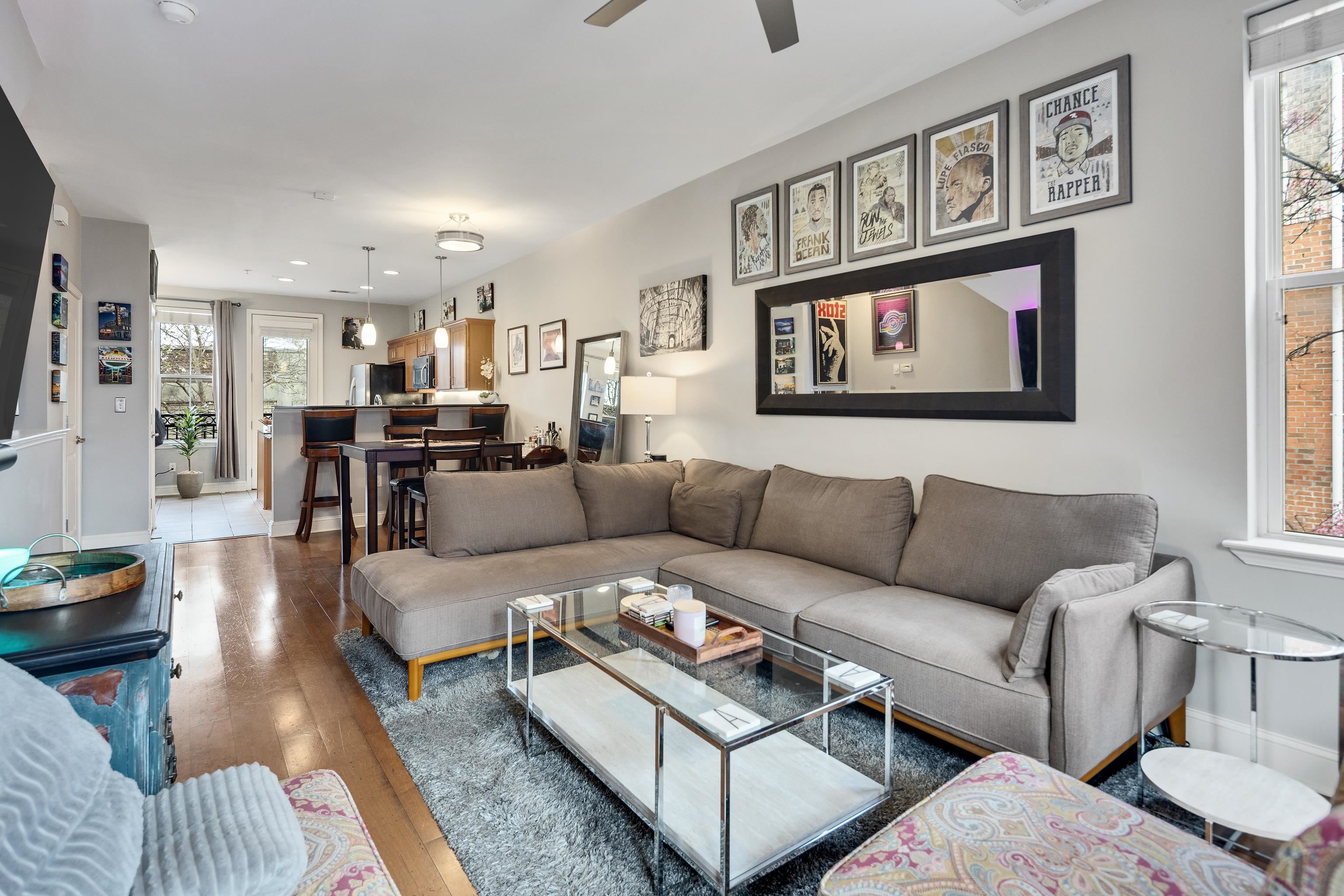 79 Shoemaker Court, Unit 108 Memphis, TN 38103 - Photo 15 of 33 a living room with furniture and kitchen view