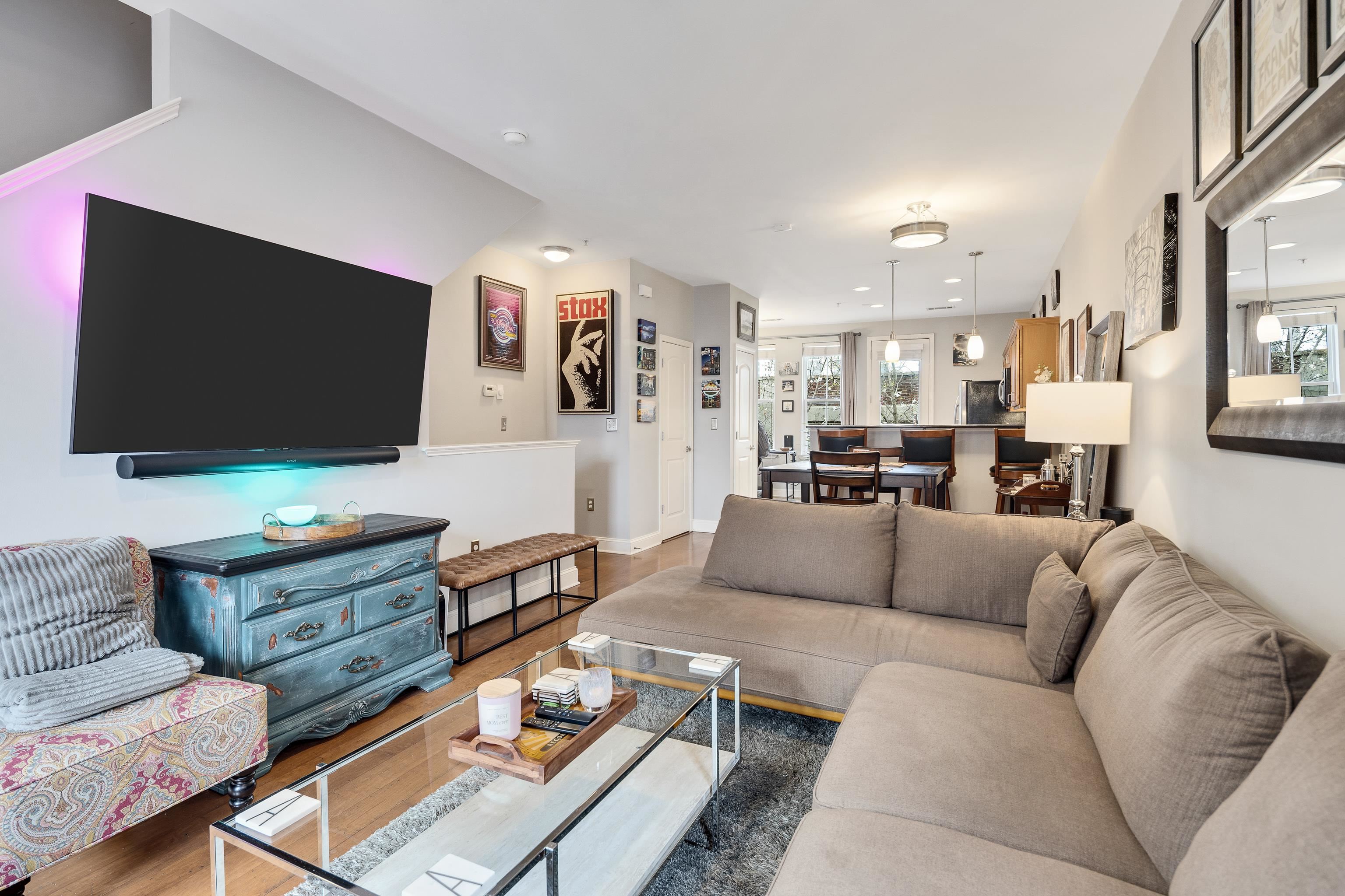 79 Shoemaker Court, Unit 108 Memphis, TN 38103 - Photo 16 of 33 a living room with furniture and a flat screen tv